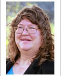 Dr. Helga George